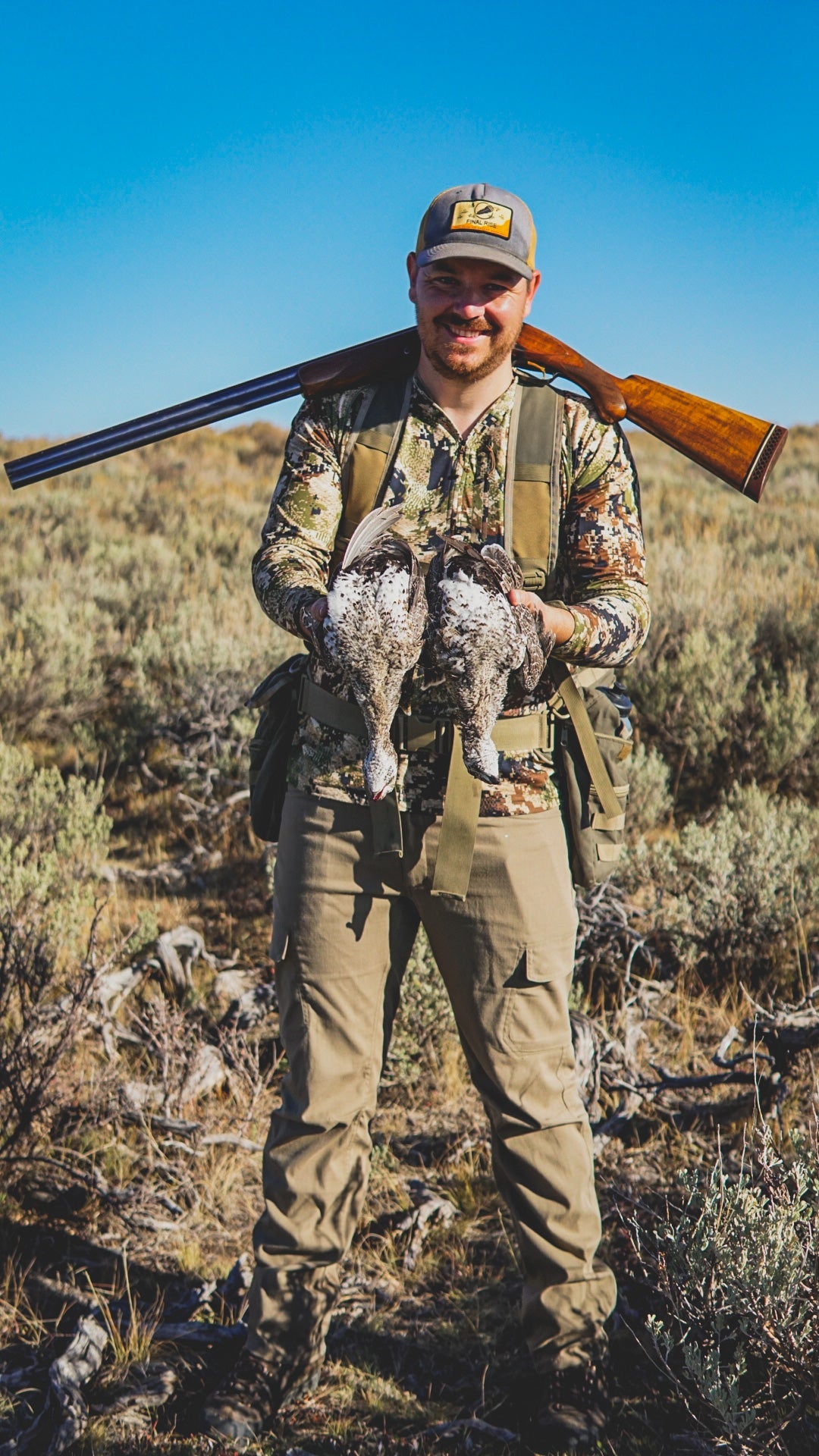 hunter with sage grouse