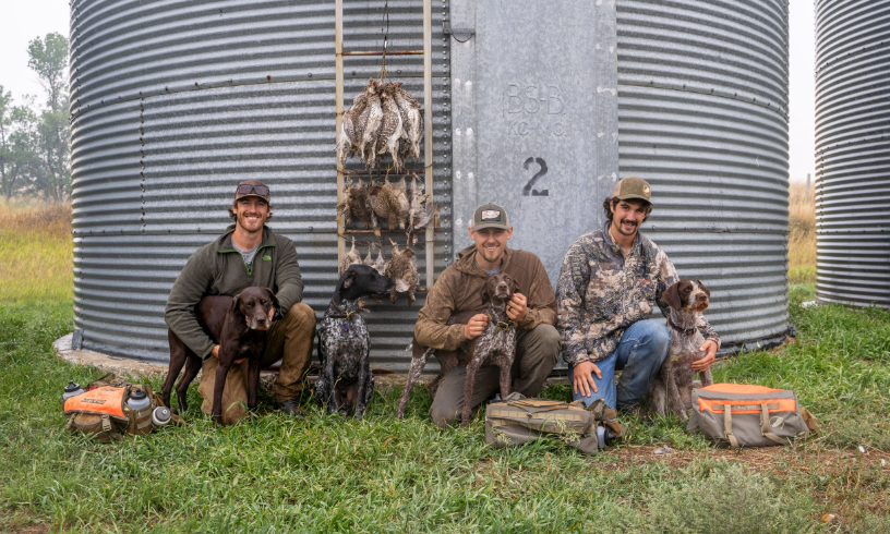 Hunters with Sharptailed Grouse